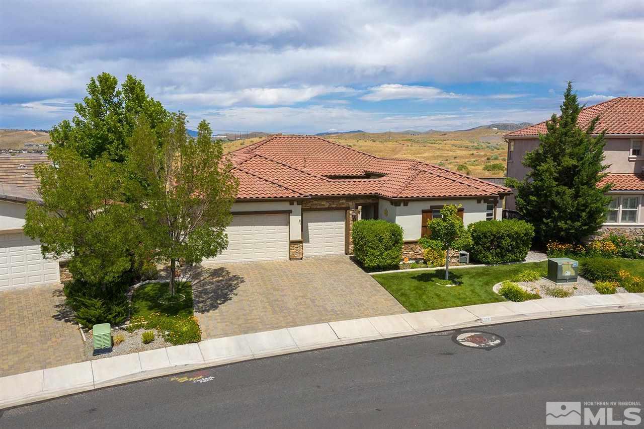 1170 South University Reno, NV 89512 - Photo 3 of 14 front view of house with a yard and potted plants