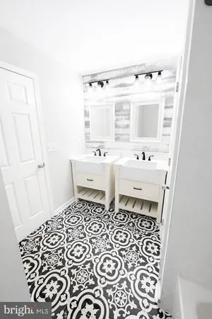 a bathroom with a sink and a toilet