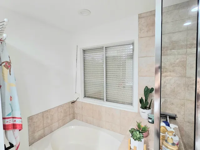 a kitchen with sink cabinets and refrigerator