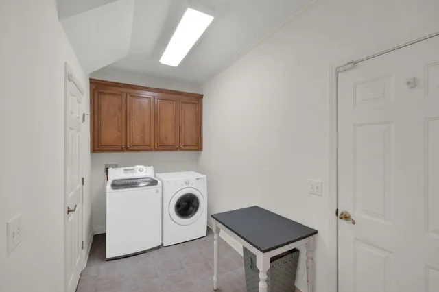a storage room with washer and dryer