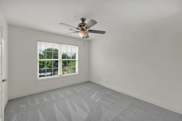 a en suite bathroom with a sink and a mirror