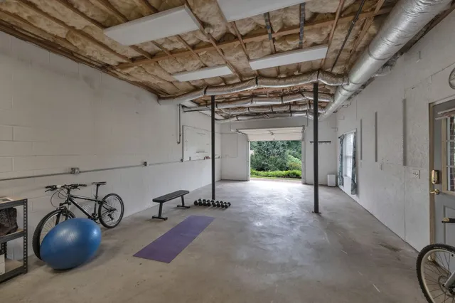a view of balcony with furniture and outdoor seating