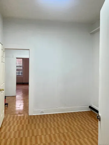 a view of an empty room and window