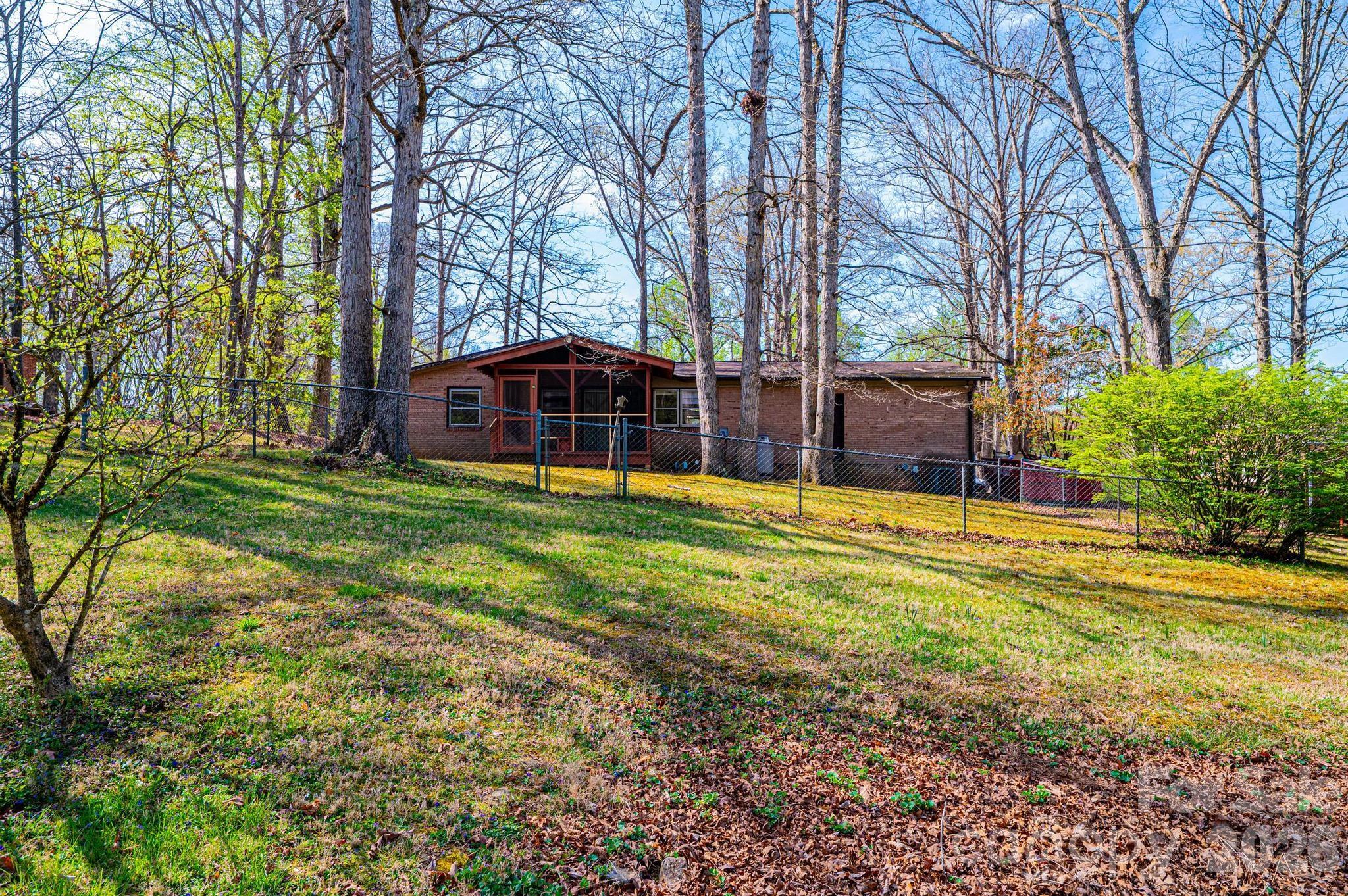 781 23rd Avenue Northeast Hickory, NC 28601 - Photo 11 of 41 a view of a house with a yard and sitting area