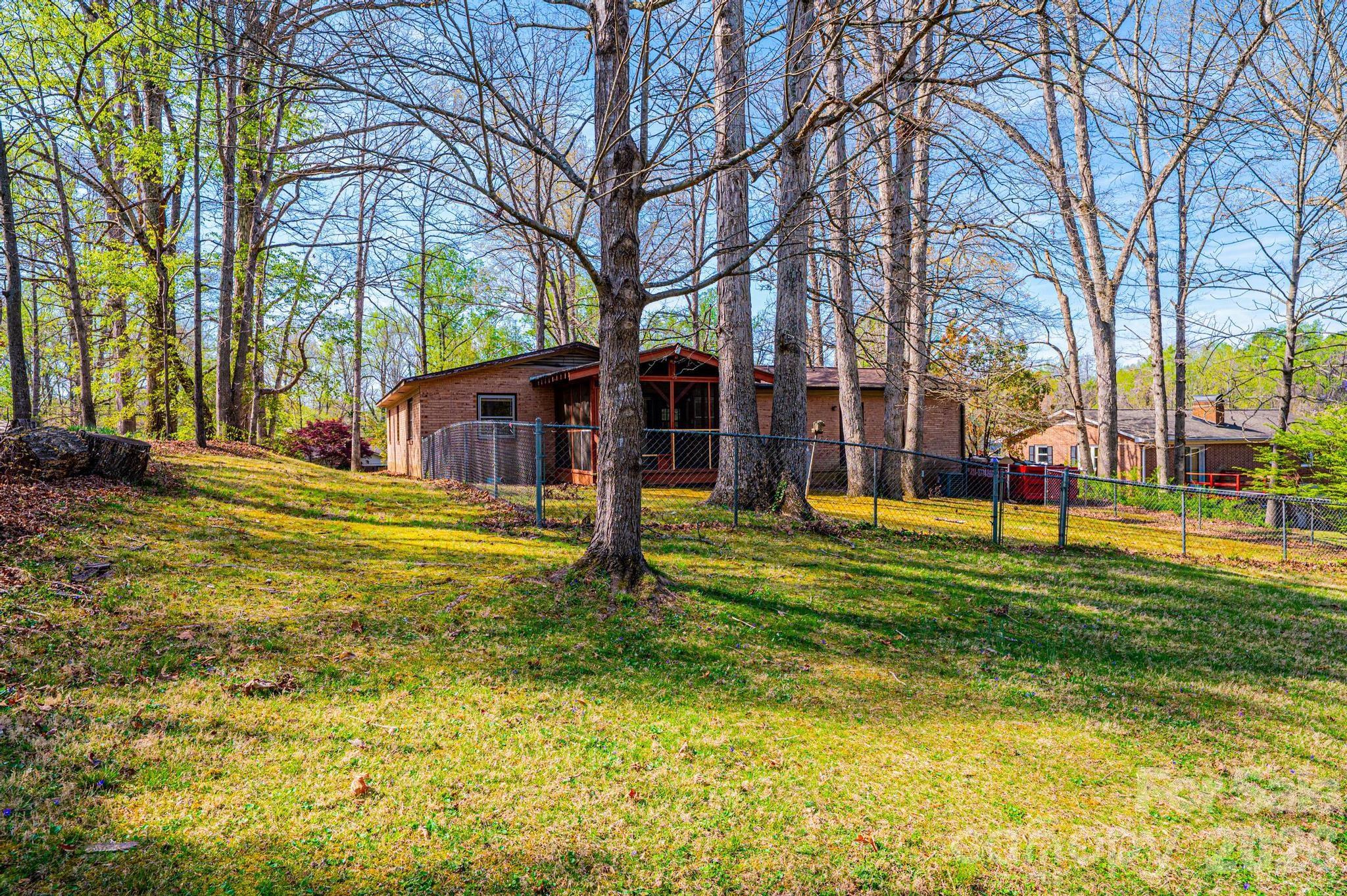 781 23rd Avenue Northeast Hickory, NC 28601 - Photo 12 of 41 a view of a house with a big yard