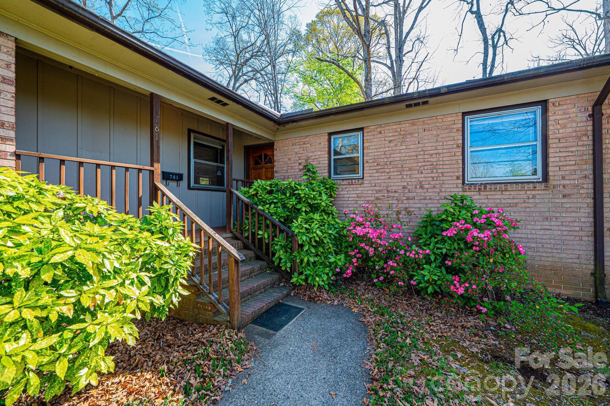 781 23rd Avenue Northeast Hickory, NC 28601 - Photo 14 of 41 a view of a house with a flower garden