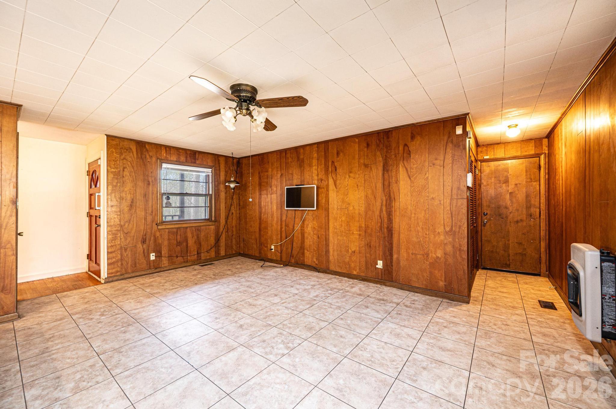 781 23rd Avenue Northeast Hickory, NC 28601 - Photo 19 of 41 a view of a livingroom with a chandelier fan and windows