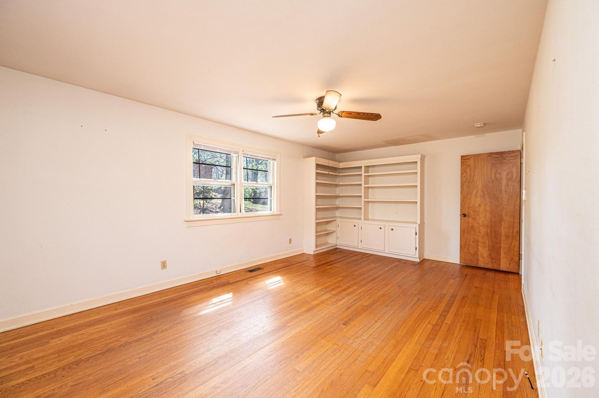 781 23rd Avenue Northeast Hickory, NC 28601 - Photo 27 of 41 wooden floor in an empty room with a window