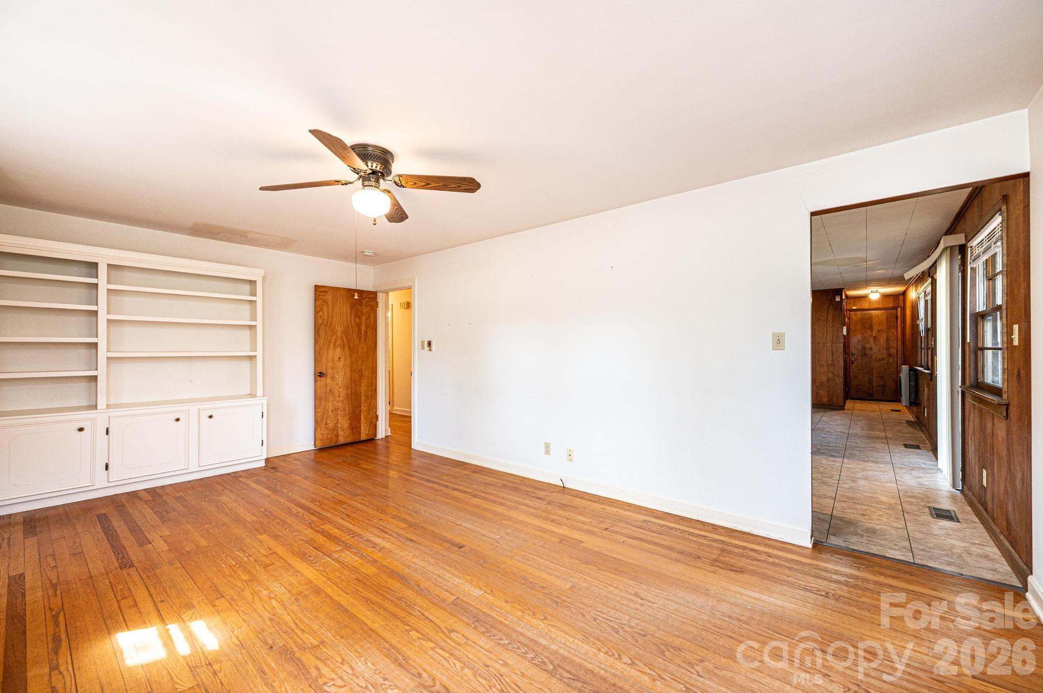 781 23rd Avenue Northeast Hickory, NC 28601 - Photo 28 of 41 a view of a room with cabinet and a ceiling fan