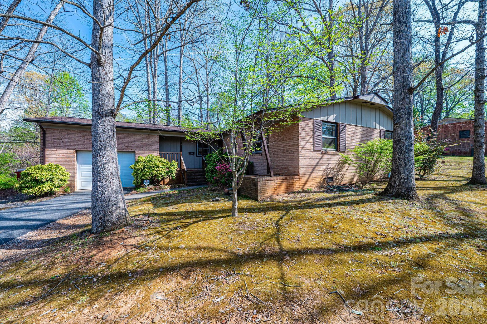 781 23rd Avenue Northeast Hickory, NC 28601 - Photo 3 of 41 a view of a house with backyard and sitting area