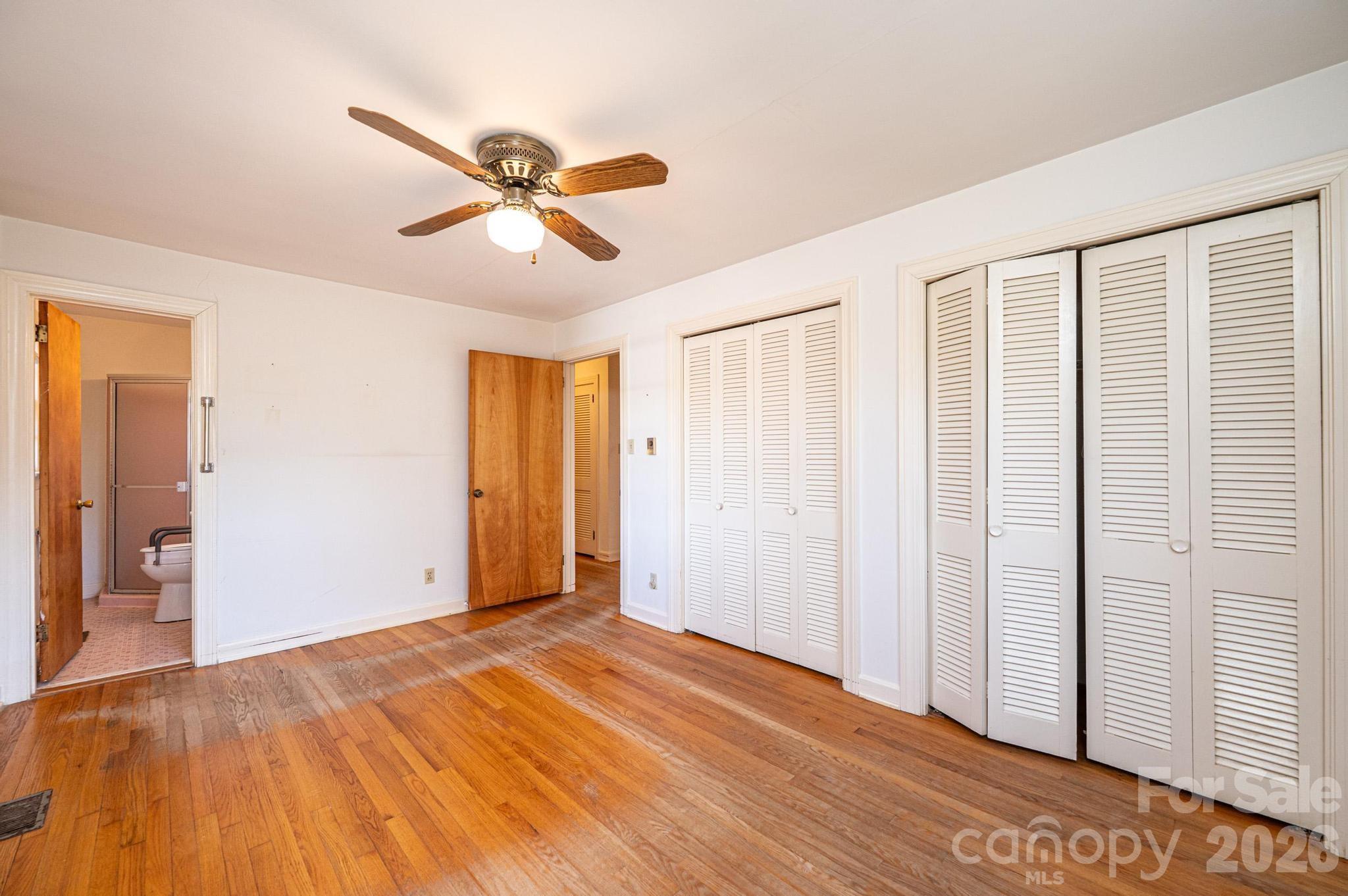 781 23rd Avenue Northeast Hickory, NC 28601 - Photo 31 of 41 a view of empty room with wooden floor and ceiling fan