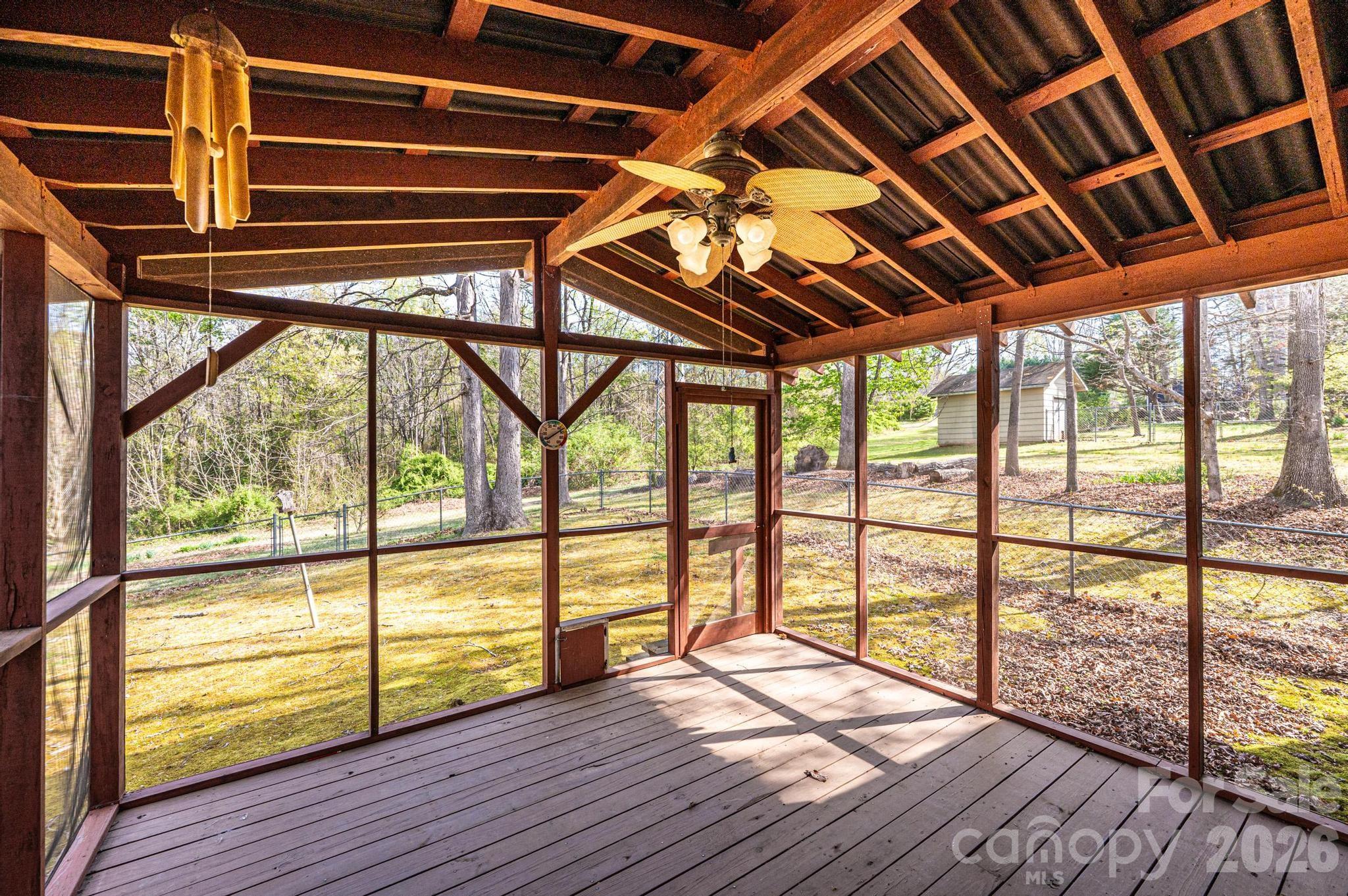 781 23rd Avenue Northeast Hickory, NC 28601 - Photo 7 of 41 a view of an empty room with wooden floor and a window