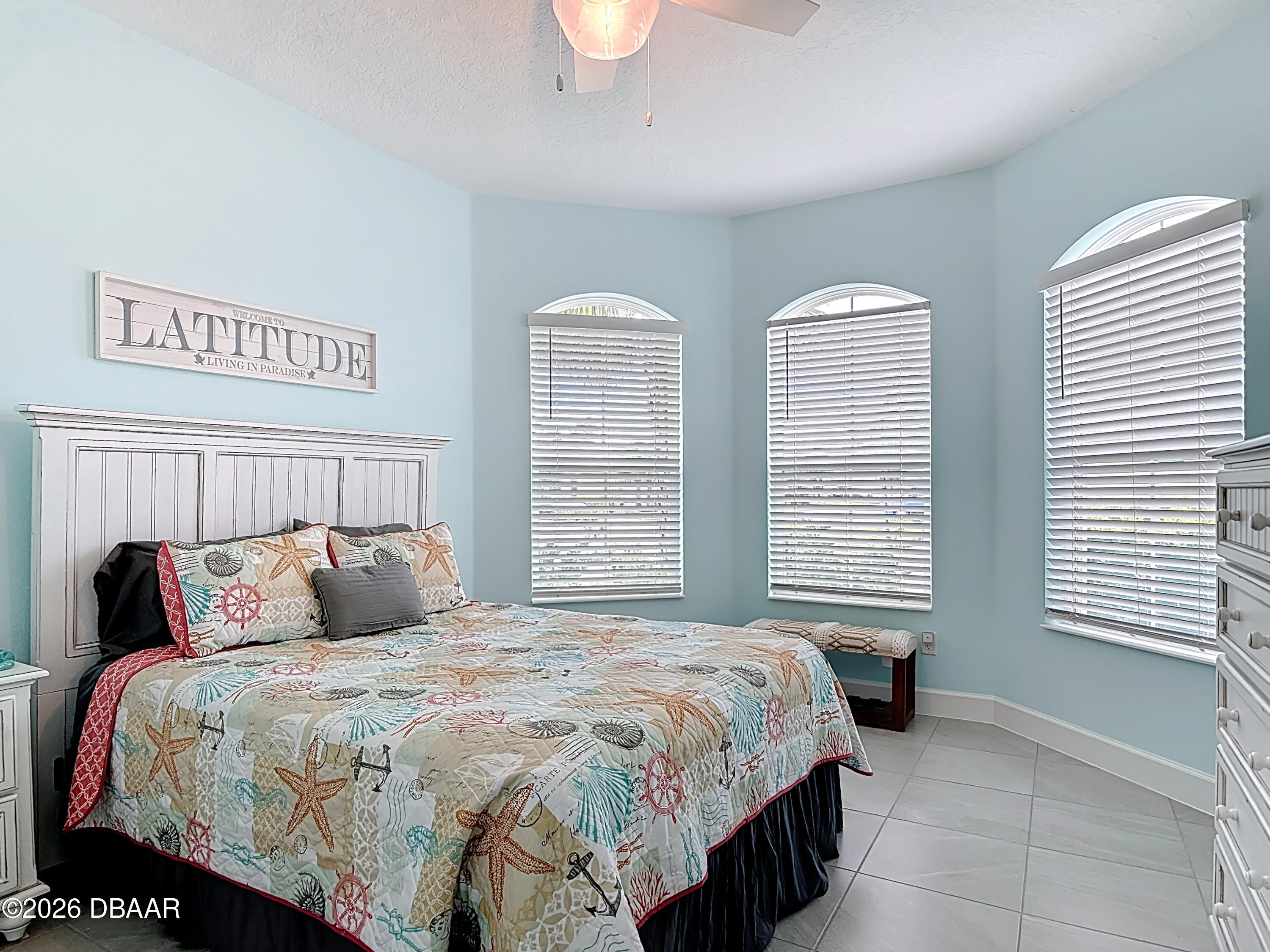 1002 Sea Shell Court Daytona Beach, FL 32124 - Photo 12 of 15 a bedroom with a bed and a window