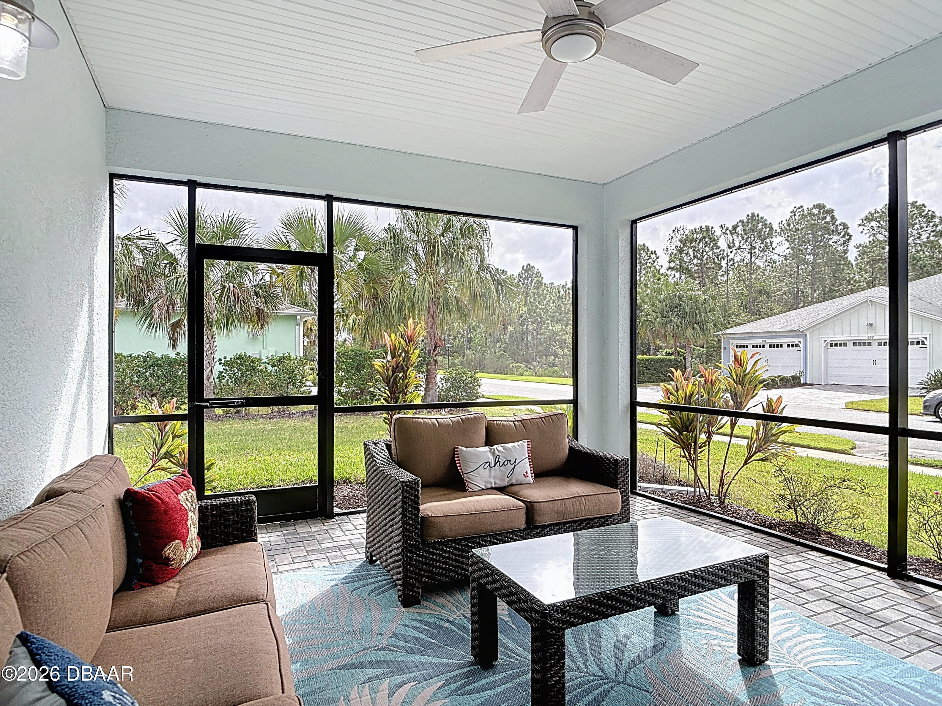 1002 Sea Shell Court Daytona Beach, FL 32124 - Photo 8 of 15 a living room with furniture and a floor to ceiling window