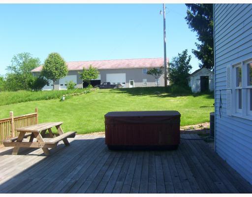 182 Clovis Ridge Road West Finley, PA 15377 - Photo 13 of 18 Patio/Deck. Private deck with hot tub.