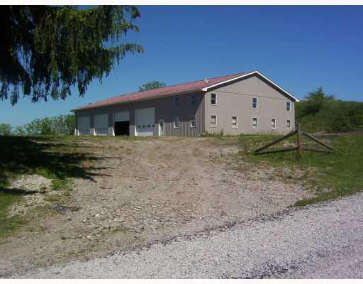 182 Clovis Ridge Road West Finley, PA 15377 - Photo 15 of 18 Parking Lot/Garage. Entrance from road to 50 X 100 garage and work shop
