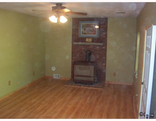 182 Clovis Ridge Road West Finley, PA 15377 - Photo 4 of 18 Living Room. Cozy winter nights with wood burner in living room