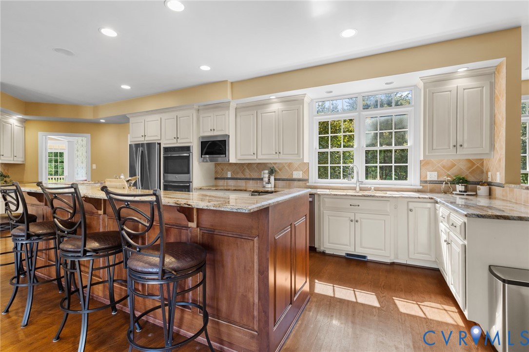 2365 State Rte 635 Midlothian, VA 23113 - Photo 11 of 64 Kitchen featuring wood-finish flooring, recessed l