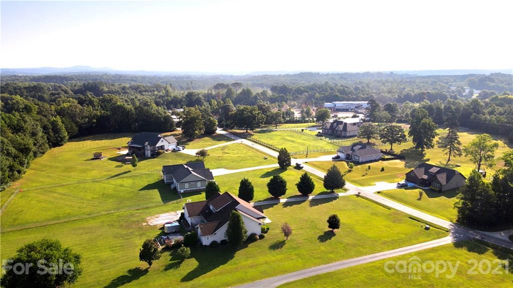315 Sunset Road, Unit 6 & 7 Landrum, SC 29356 - Photo 8 of 15 a view of a swimming pool with a patio