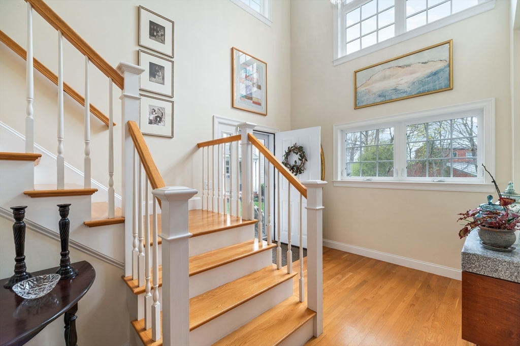 6 Essex Road, Unit 8 Ipswich, MA 01938 - Photo 14 of 35 a view of entryway and hall with wooden floor