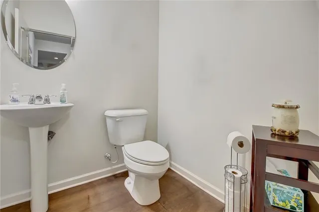 a view of entryway with stairs and wooden floor