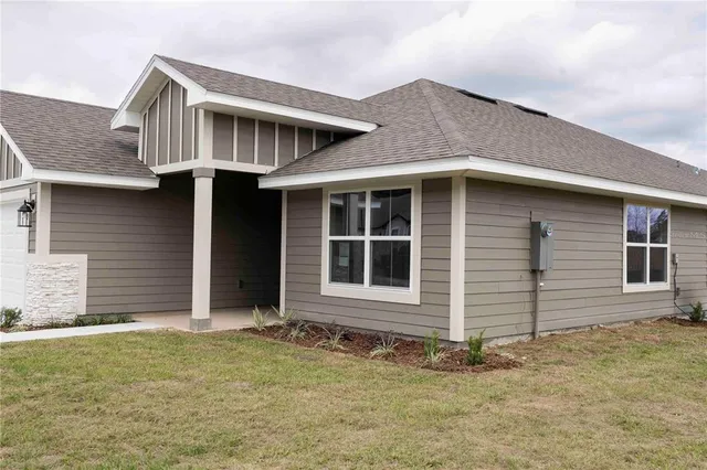 a house with yard in front of it