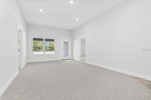 a kitchen with sink and cabinets