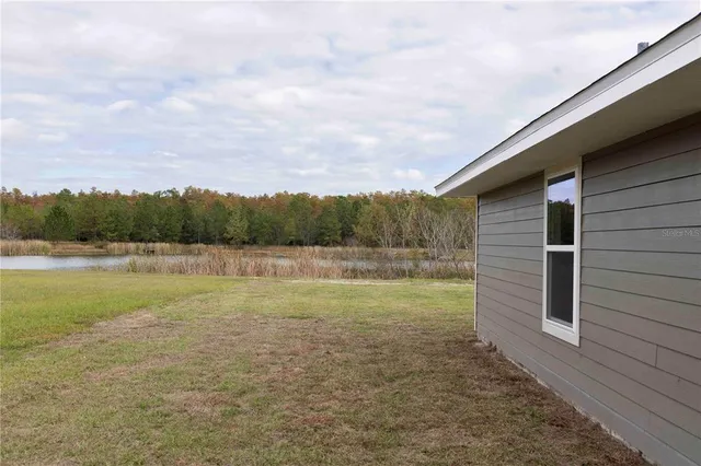 a view of a outdoor space and a lake view