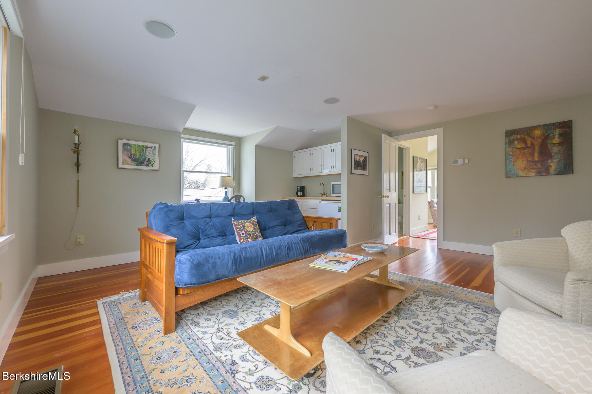 11 Sergeant Street Stockbridge, MA 01262 - Photo 46 of 52 a living room with furniture and a rug