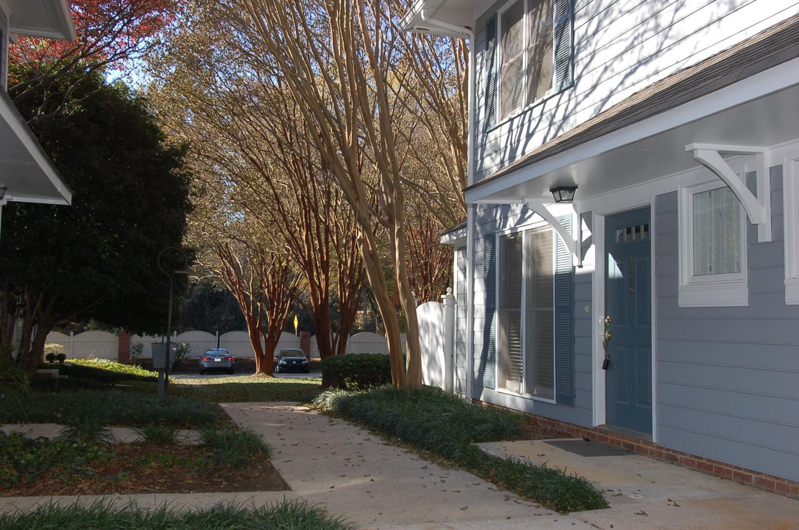 1450 Barton Pl Drive Raleigh, NC 27608 - Photo 2 of 11 a view of a house with a yard