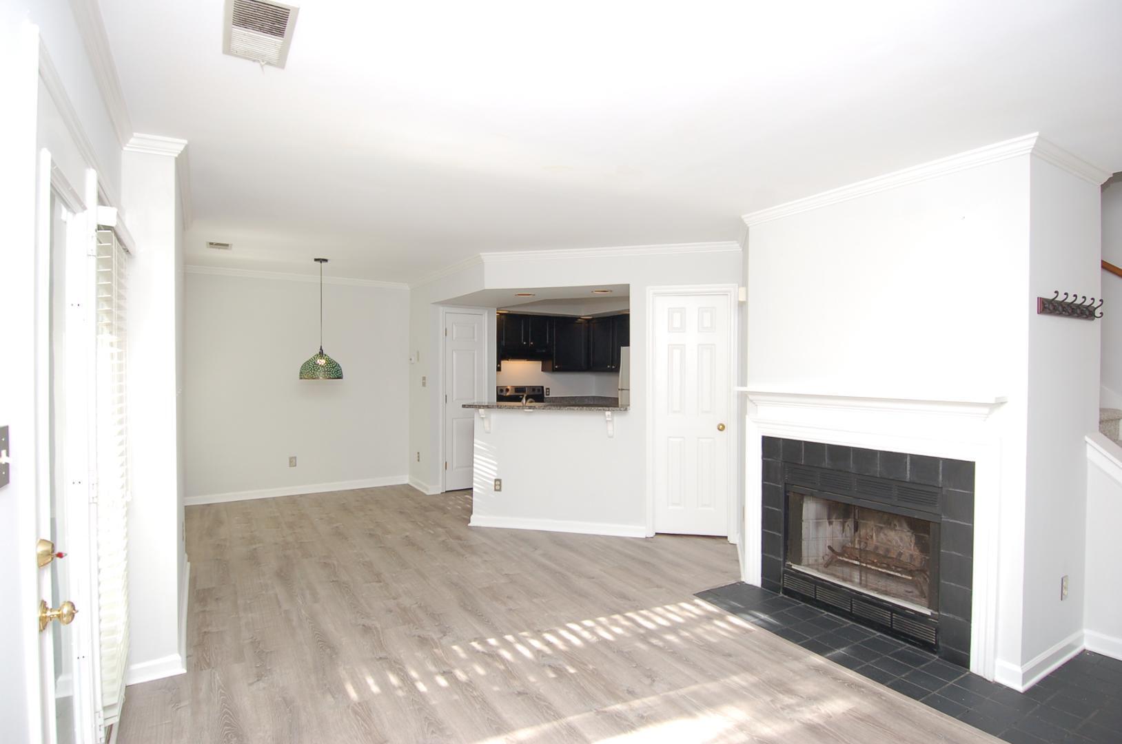 1450 Barton Pl Drive Raleigh, NC 27608 - Photo 5 of 11 a view of a livingroom with a fireplace