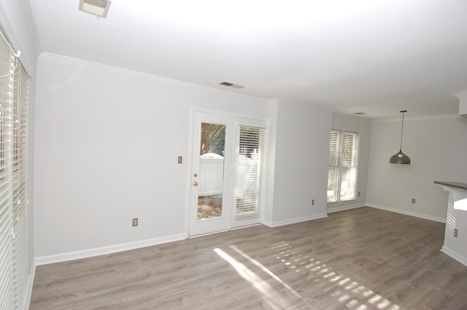 1450 Barton Pl Drive Raleigh, NC 27608 - Photo 6 of 11 an empty room with windows and closet