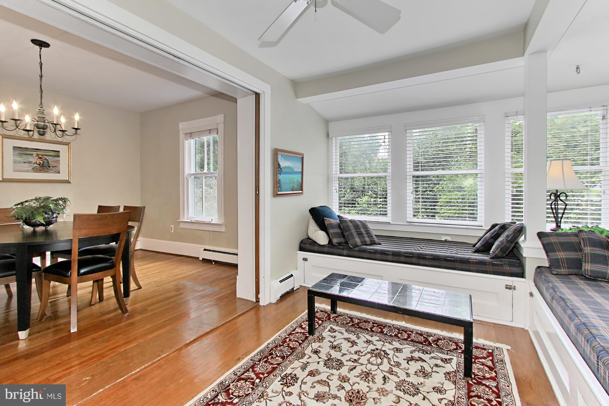 6800 Newman Road Clifton, VA 20124 - Photo 5 of 30 Pocket doors open between Dining Rm & Sunroom