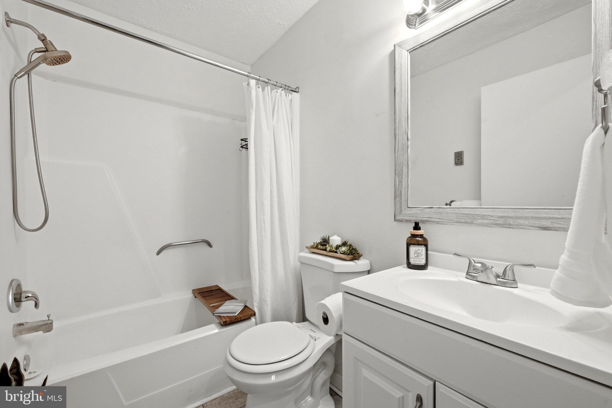 137 Brunswick Road Stephens City, VA 22655 - Photo 24 of 28 Bathroom w/closet to left in hall...storage!