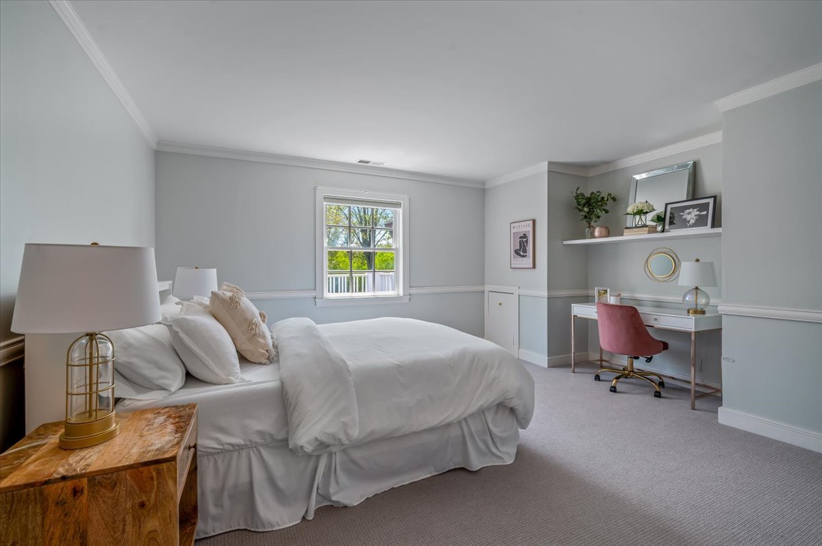 280 Old Farm Road Northfield, IL 60093 - Photo 43 of 64 a bedroom with a bed and wooden floor