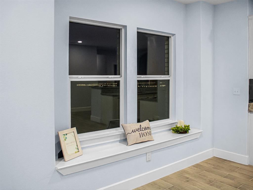 1013 Magnolia Court Springtown, TX 76082 - Photo 16 of 33 a bathroom with a sink and vanity