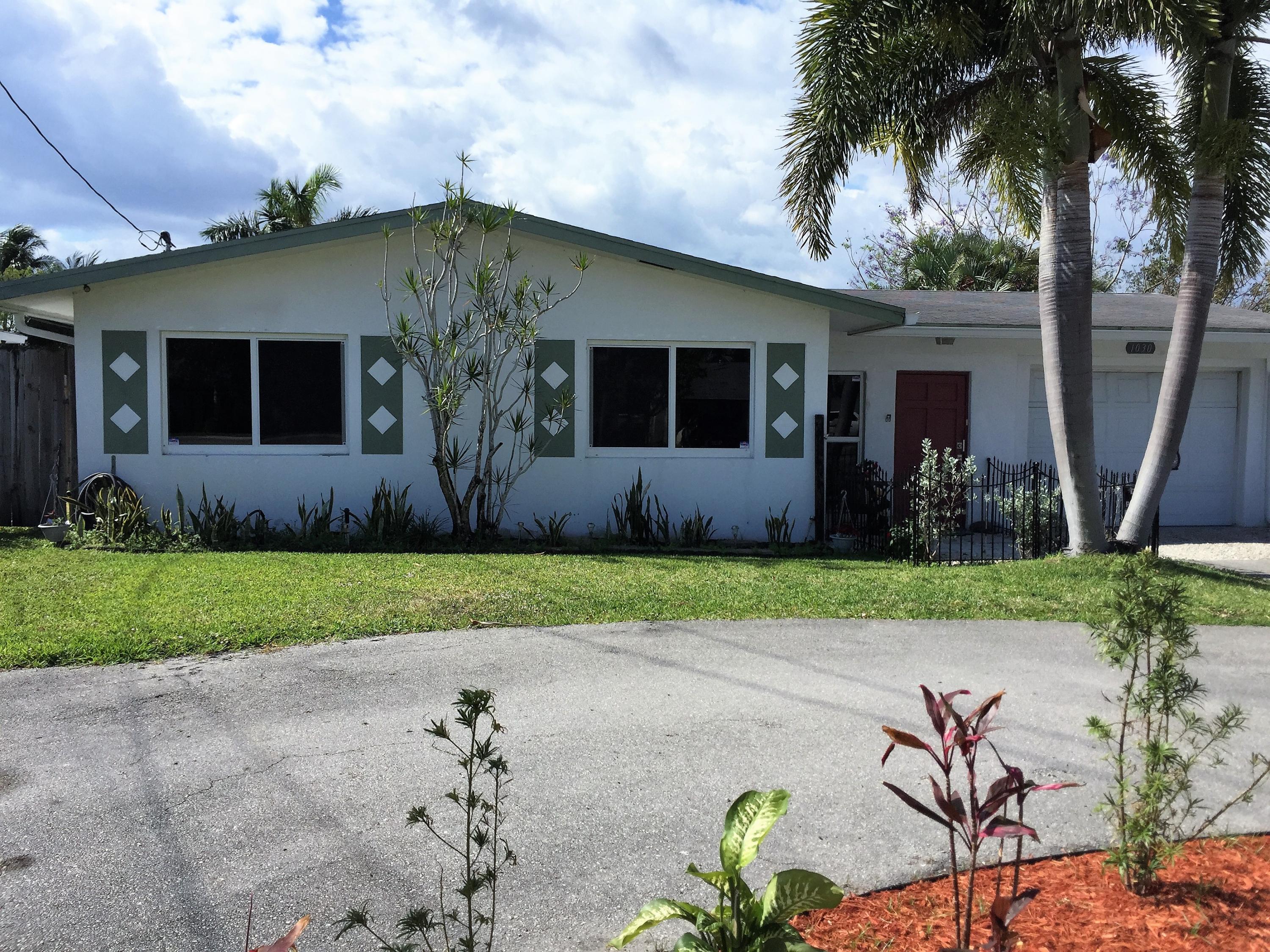 1030 Old Boynton Road Boynton Beach, FL 33426 - Photo 2 of 30 front house circular driveway, garage