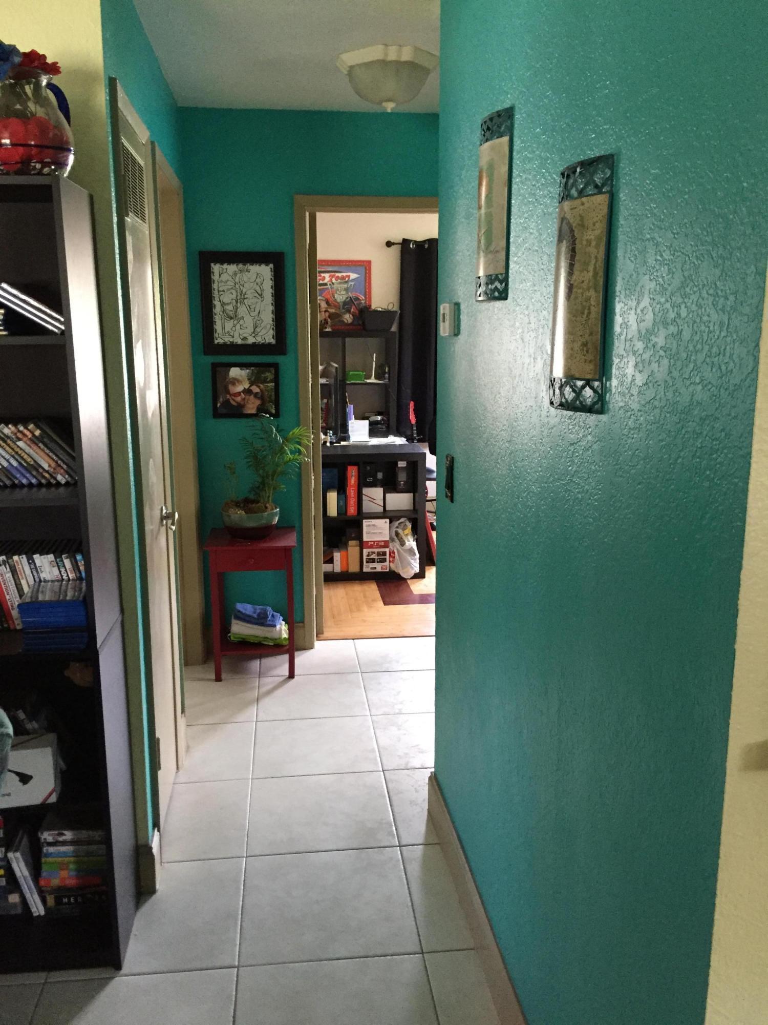 1030 Old Boynton Road Boynton Beach, FL 33426 - Photo 7 of 30 hallway to bedrooms