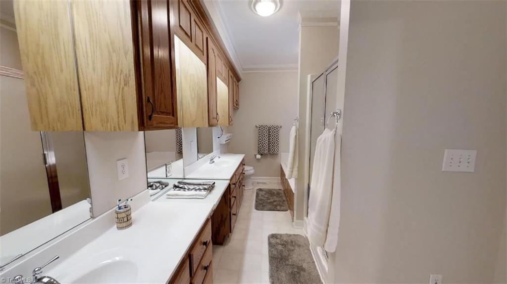 571 Carson Road Pilot Mountain, NC 27041 - Photo 16 of 30 Master bath with tons of storage space, jetted tub & separate shower.