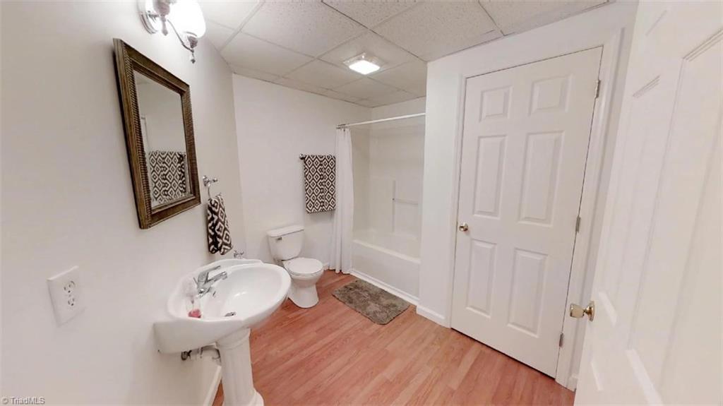 571 Carson Road Pilot Mountain, NC 27041 - Photo 25 of 30 Basement full bath with linen closet.