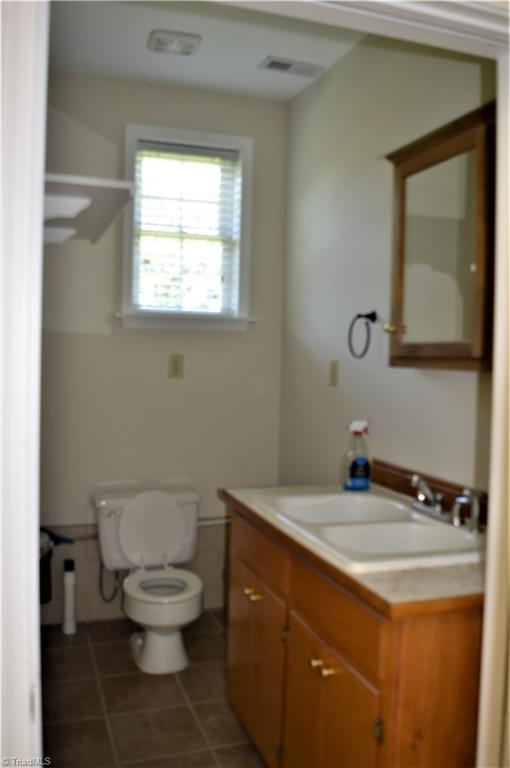 571 Carson Road Pilot Mountain, NC 27041 - Photo 30 of 30 Detached garage half bath is very convenient.