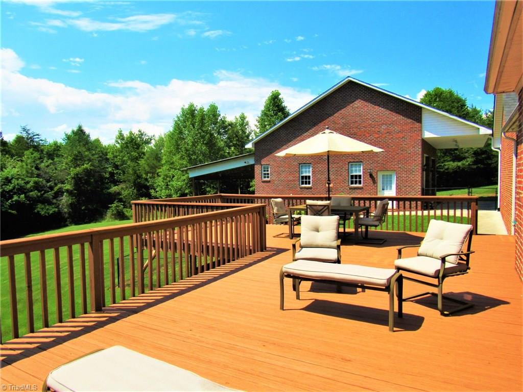 571 Carson Road Pilot Mountain, NC 27041 - Photo 7 of 30 Side view from the deck of the amazing detached garage.