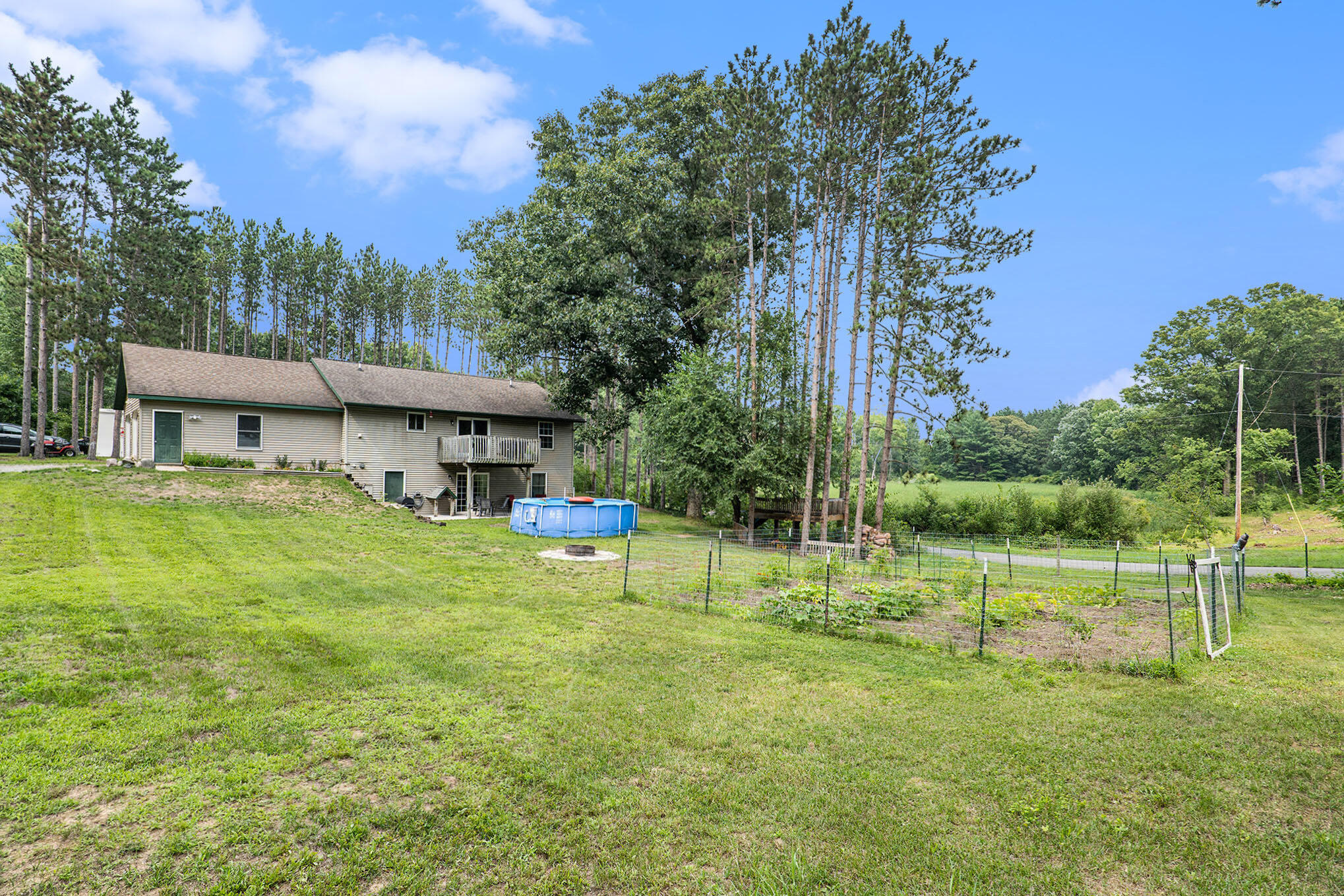10601 West Colby Road Gowen, MI 49326 - Photo 18 of 20 back yard