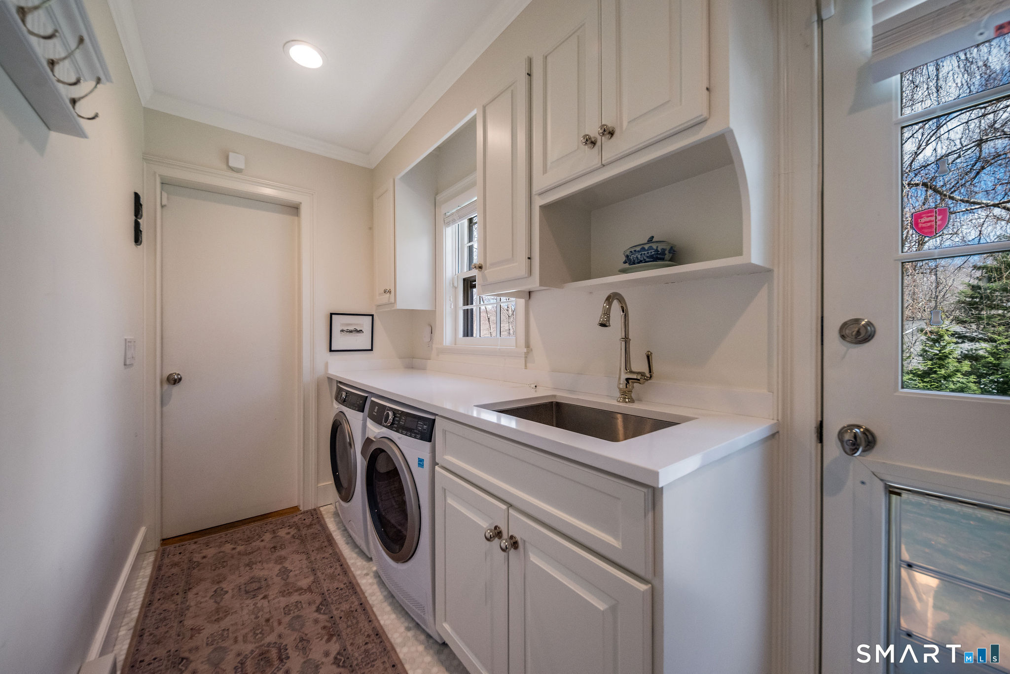 9 Matson Ridge Old Lyme, CT 06371 - Photo 18 of 42 Laundry/Mud Room leading in from garage and door to the backyard