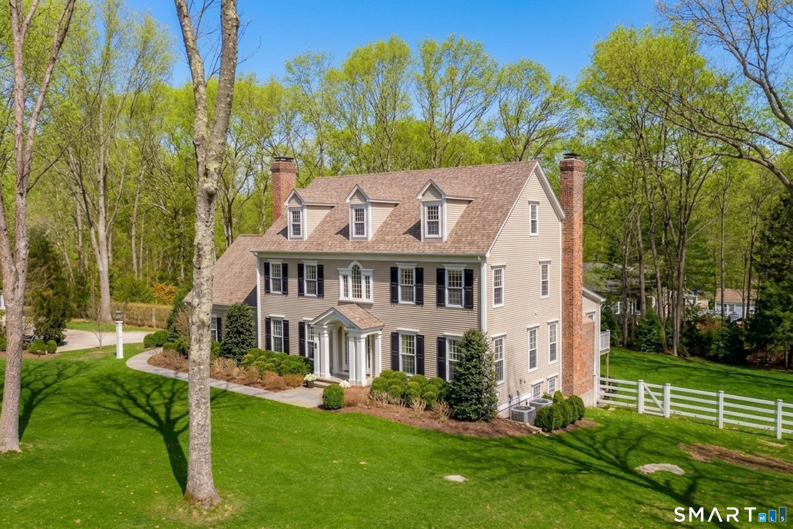 9 Matson Ridge Old Lyme, CT 06371 - Photo 2 of 42 Professionally landscaped grounds with irrigation system and fully fenced
