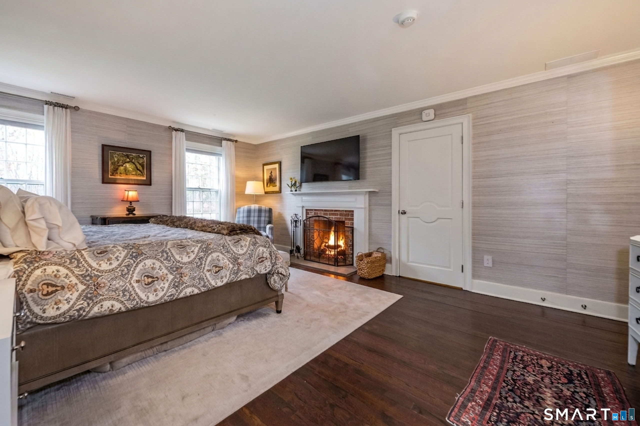 9 Matson Ridge Old Lyme, CT 06371 - Photo 28 of 42 Relaxing Primary with a back set of stairs to the kitchen.