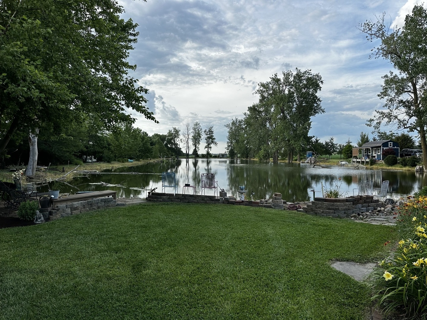 860 East 1100 Road Champaign, IL 61822 - Photo 20 of 60 a view of a lake with houses in the background