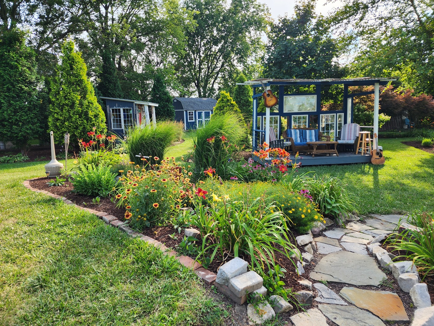 860 East 1100 Road Champaign, IL 61822 - Photo 35 of 60 a view of a chair and tables in the garden