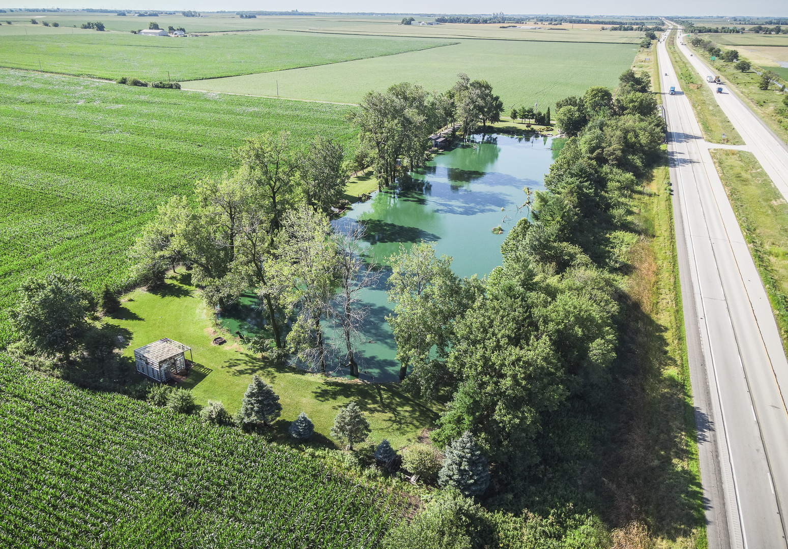 860 East 1100 Road Champaign, IL 61822 - Photo 59 of 60 a view of a lake with a yard
