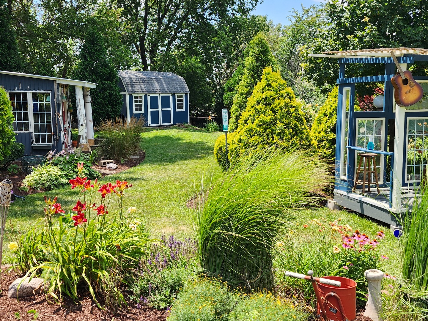 860 East 1100 Road Champaign, IL 61822 - Photo 9 of 60 a view of a garden with plants and large trees